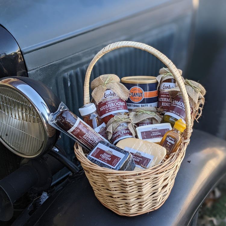 Southern Charcuterie Sampler with Summer sausage, Honey, chesse, pickled items, jams, jellies, peanuts
