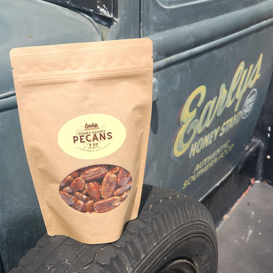 Honey Glazed Pecans on a spare tire of a vintage Early's Honey Stand Branded Truck
