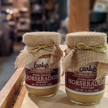 A spoonful of Early's Honey Stand's Stoneground Horseradish Mustard, made with pure ground horseradish and mustard seeds,